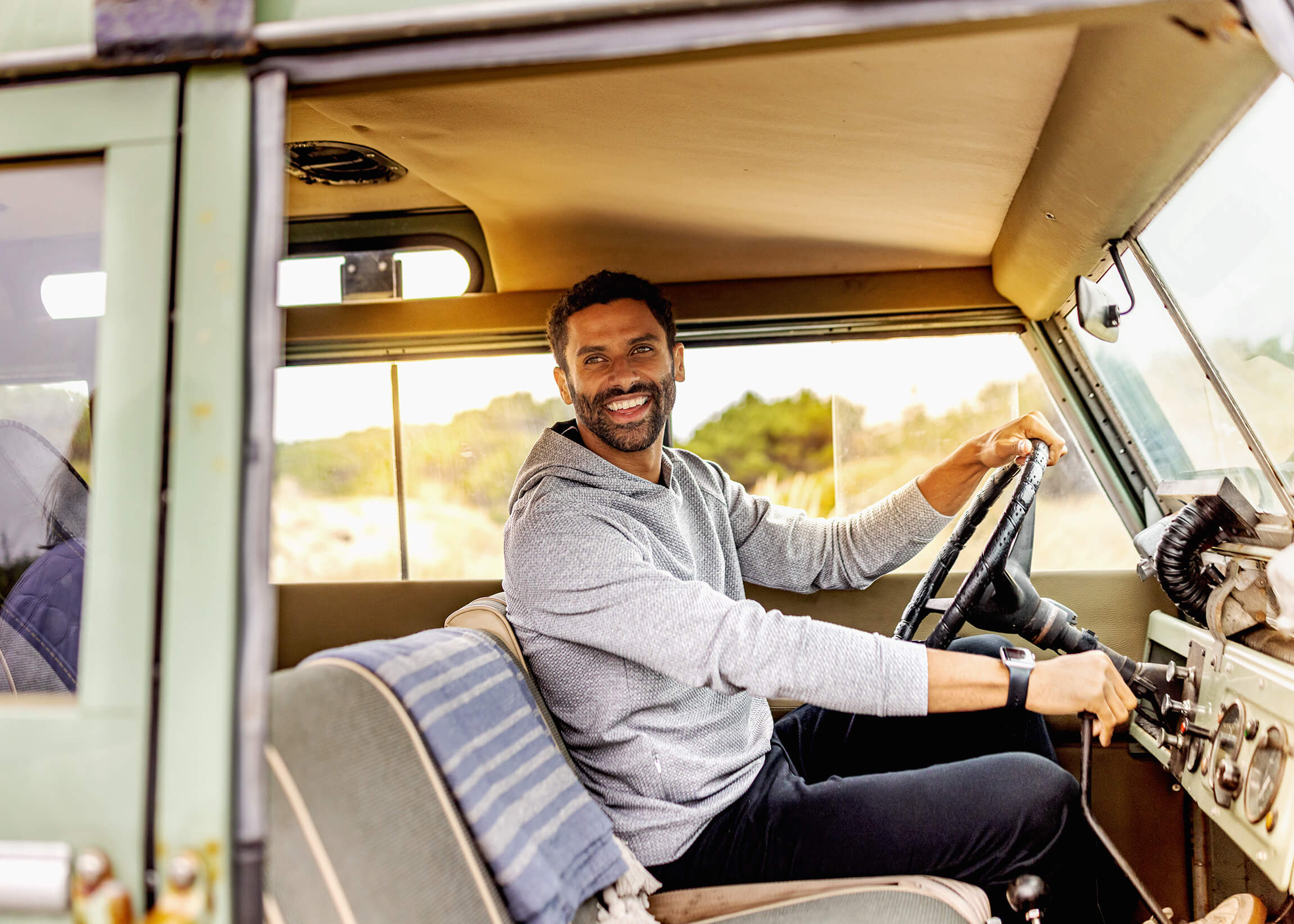 man stading at campsite in the cascade mountains-sleeping lady resort-cutter and buck- camping-outdoors-tent-estepworks commercial lifestyle photography