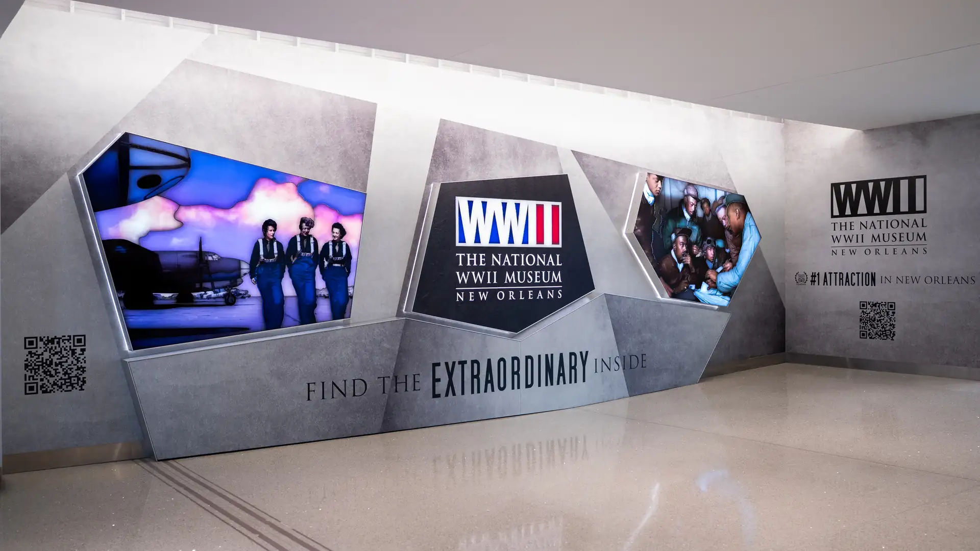National WWII Museum Watercolors installation with illuminated historical portraits at New Orleans International Airport.