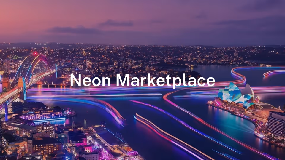 Night aerial view of Sydney Harbour with illuminated Sydney Opera House, Harbour Bridge, and neon light trails on the water.