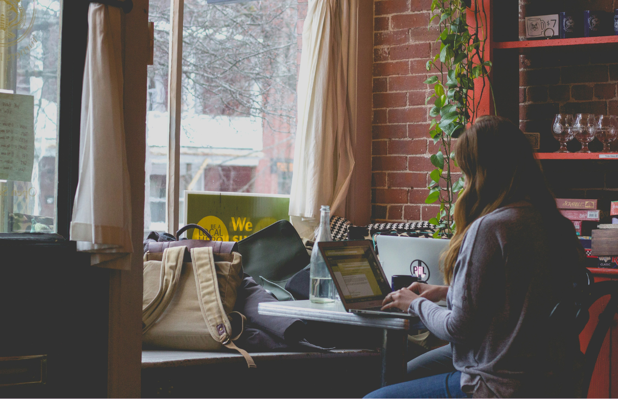 studying for beauty school in coffee shop