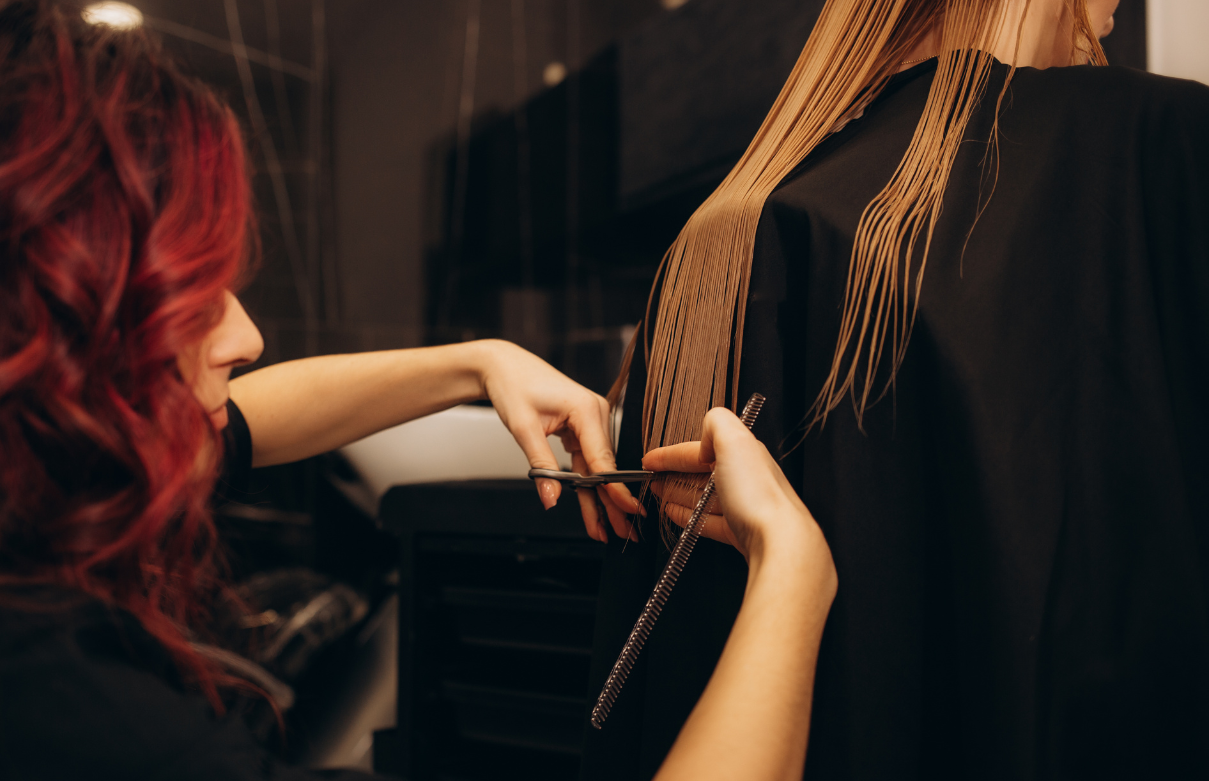Cosmetology student practicing hair color application during daytime class at Beyond 21st Century Beauty Academy in Santa Fe Springs