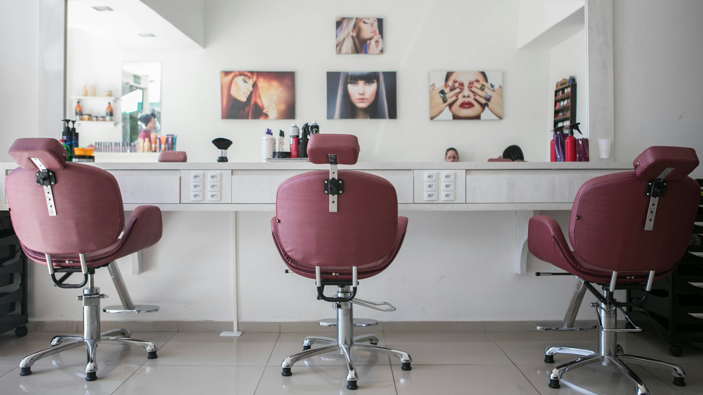 Beauty salon interior with styling stations