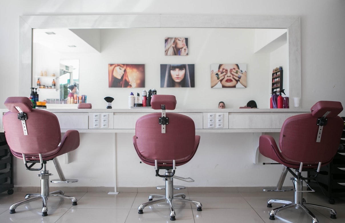 Beauty salon interior with styling stations
