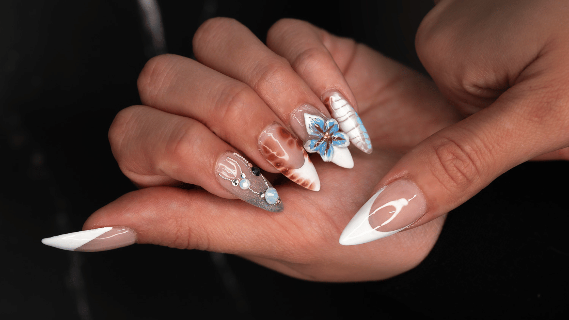 Nail technician student training at Beyond 21st Century Beauty Academy