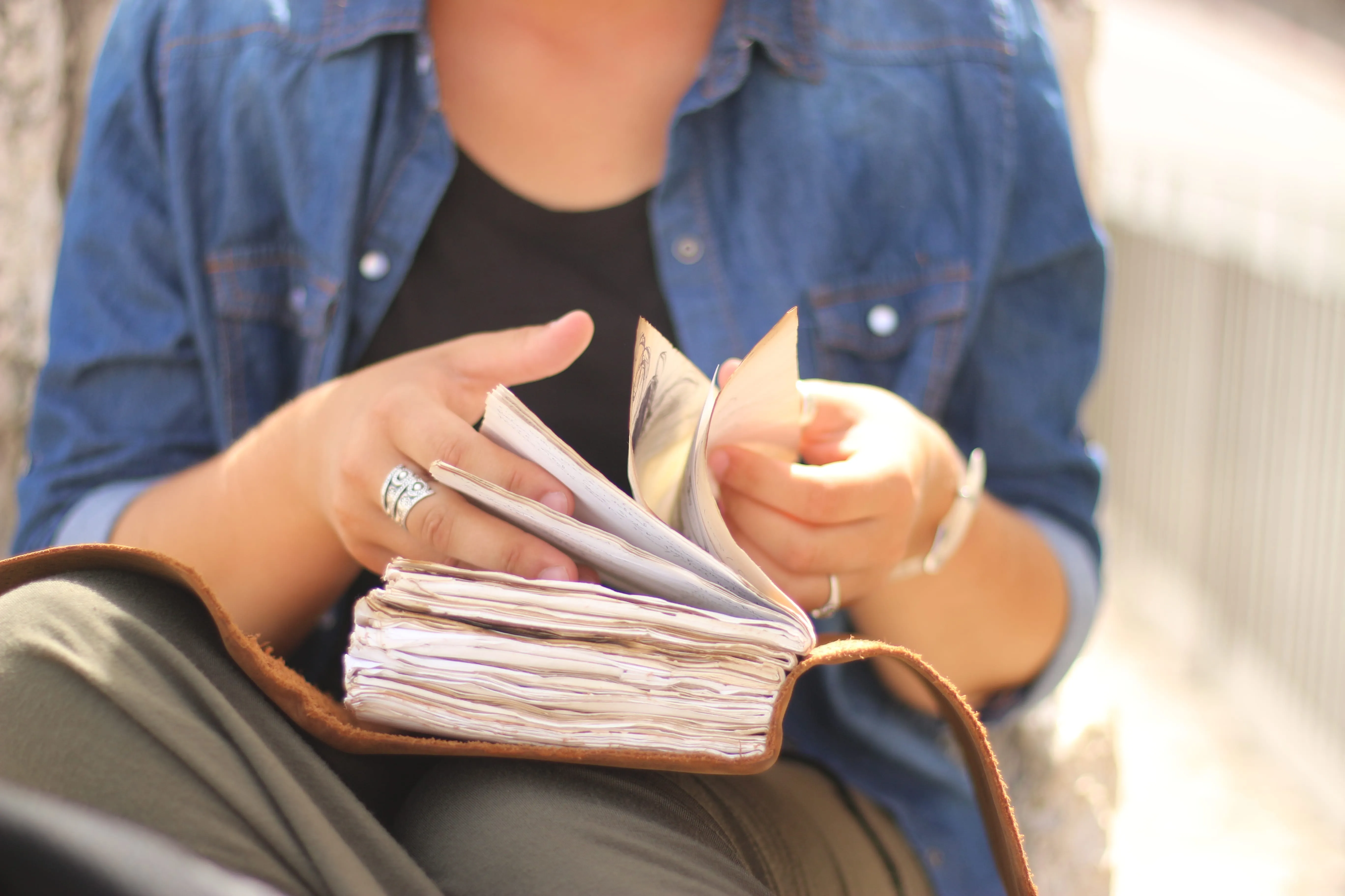 Student pages through a Bible