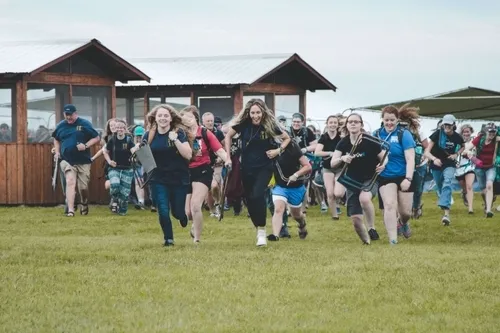 Students at Training Camp, running to worship