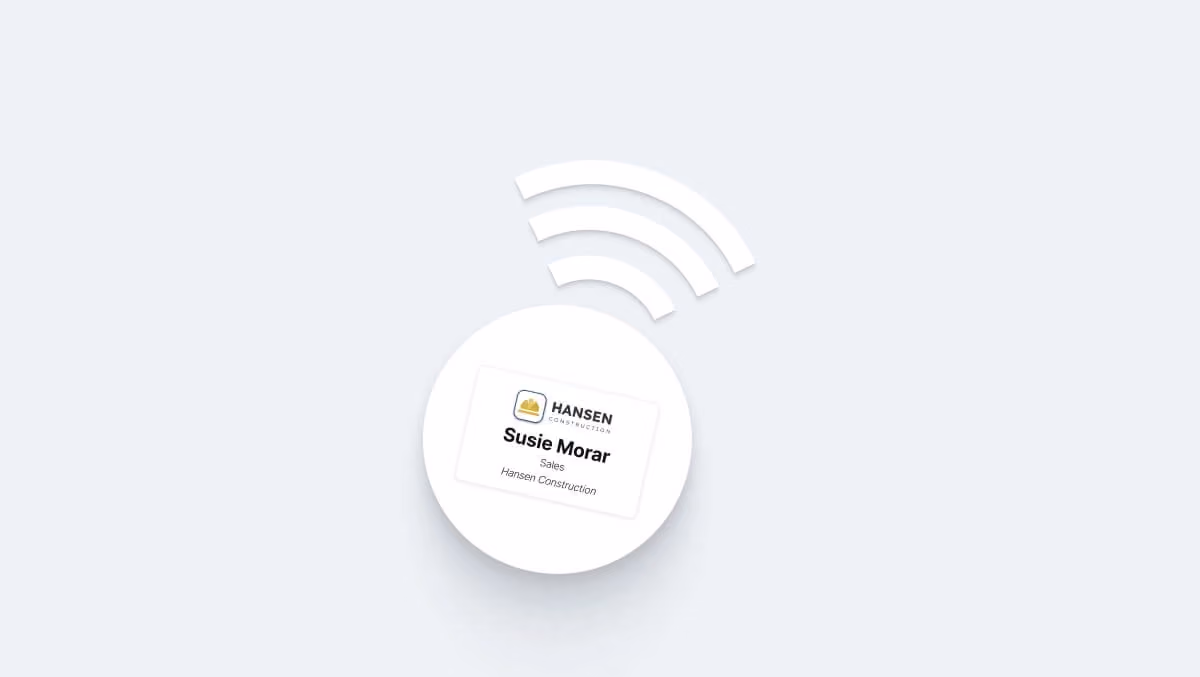 An NFC business card with wireless signal graphics representing tap-to-share functionality.