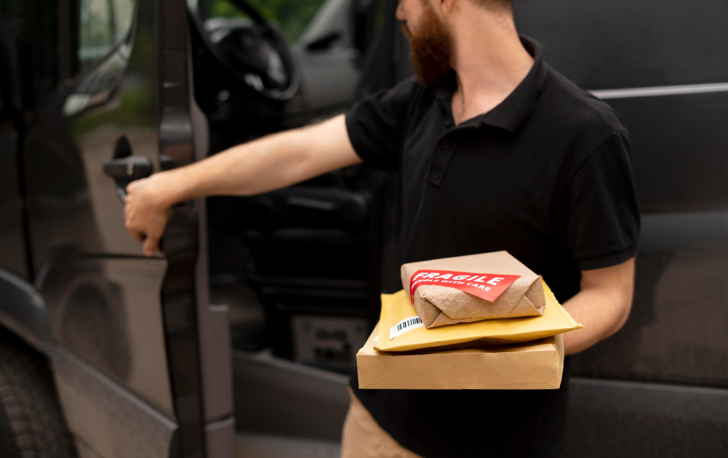 Alt text: Close up delivery man carrying packs
