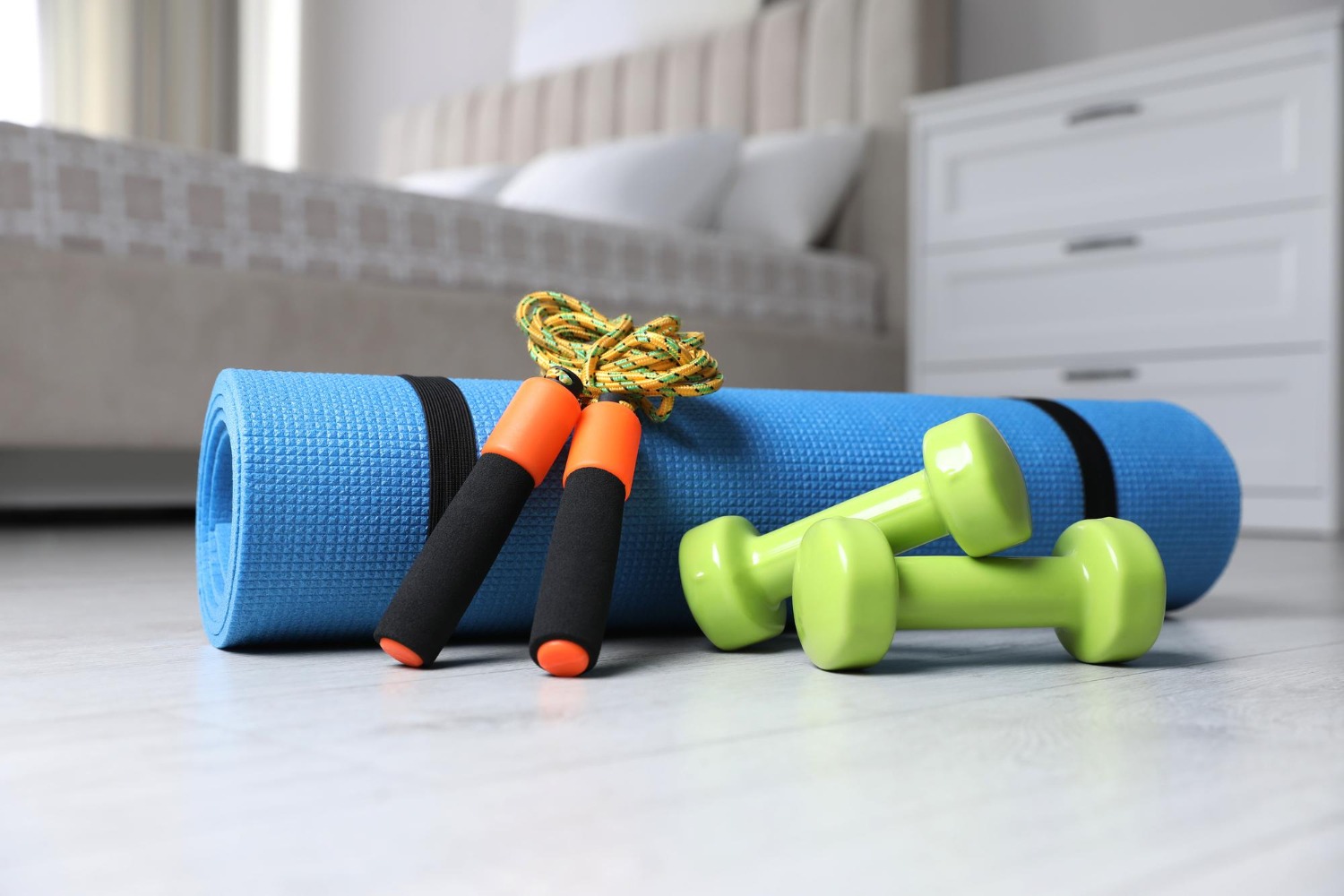 Alt text: Exercise equipment on the bedroom floor