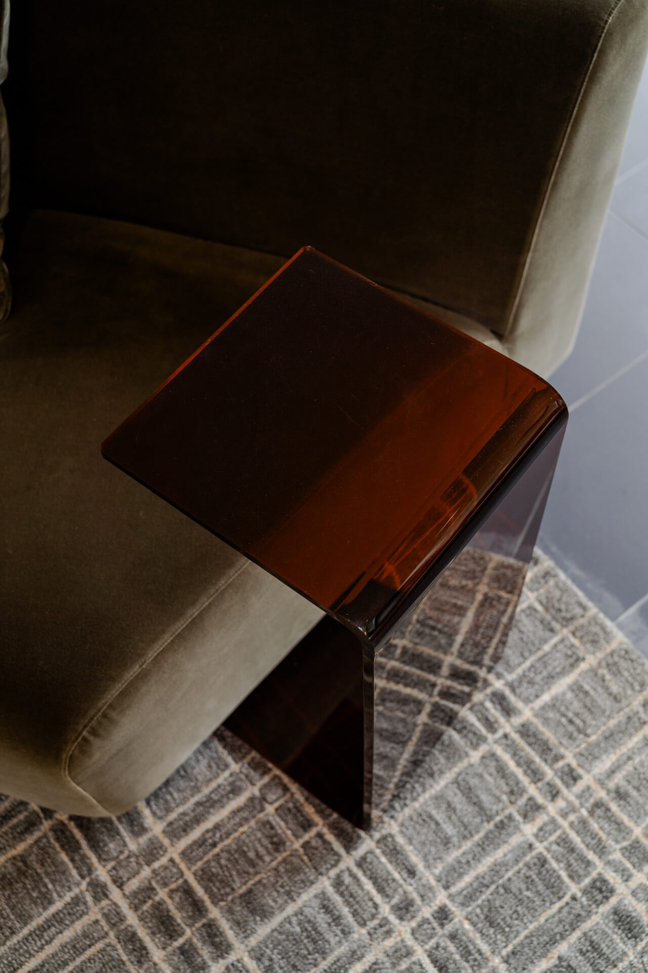 Couch with side table in Continental Tower lobby