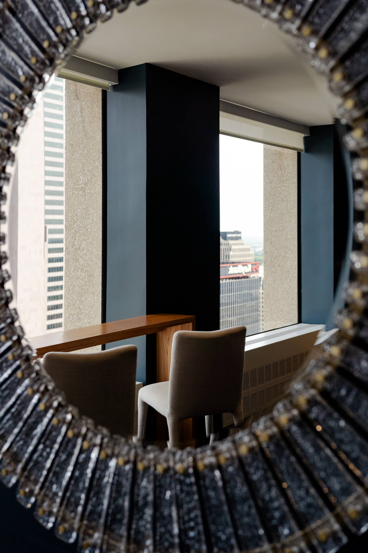 Large round mirror in Continental Tower speakeasy