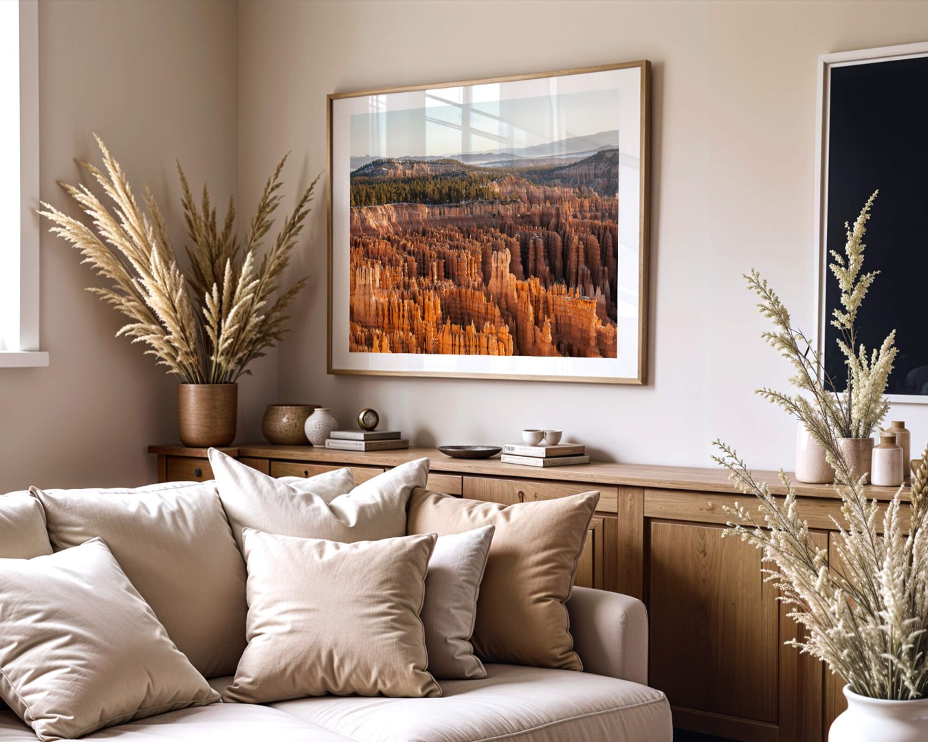 A framed photo of the hoodoo rock formations in Bryce Canyon on a living room wall