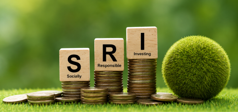 Stacked coins and ESG blocks representing socially responsible investing and sustainable growth.