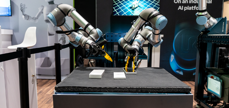 Collaborative robotic arms performing automated tasks, illustrating industrial automation among the best robotics stocks.
