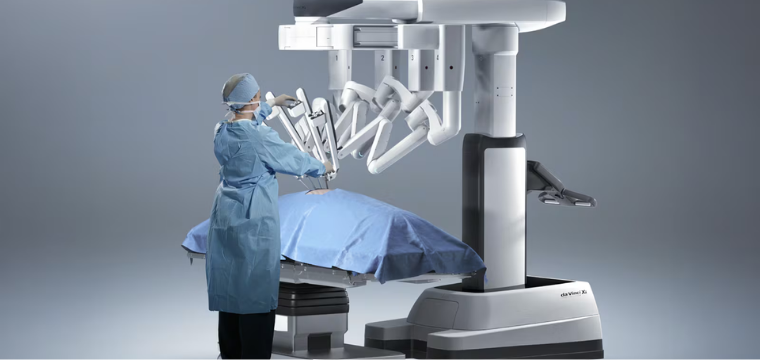 Robotic surgical system assisting a surgeon, highlighting Intuitive Surgical among the best robotics stocks.