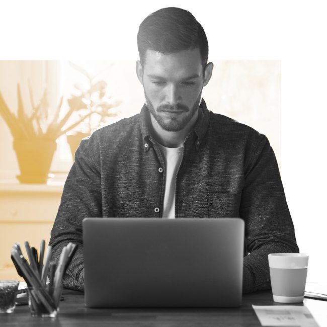 SPX Agency Lab: Gig economy, young man working on laptop