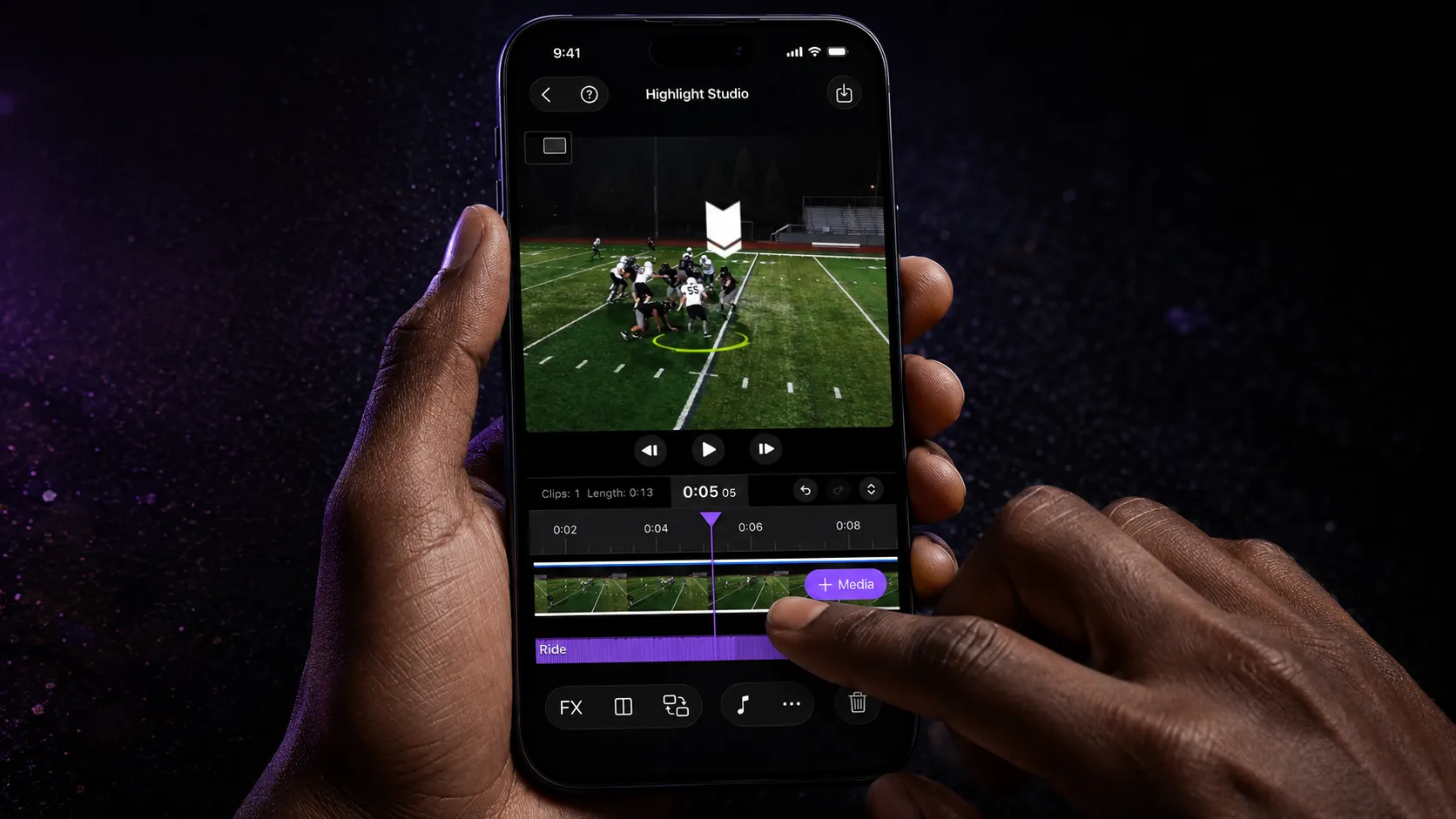 Person editing football game video on a phone using Highlight Studio app, with timeline controls visible.