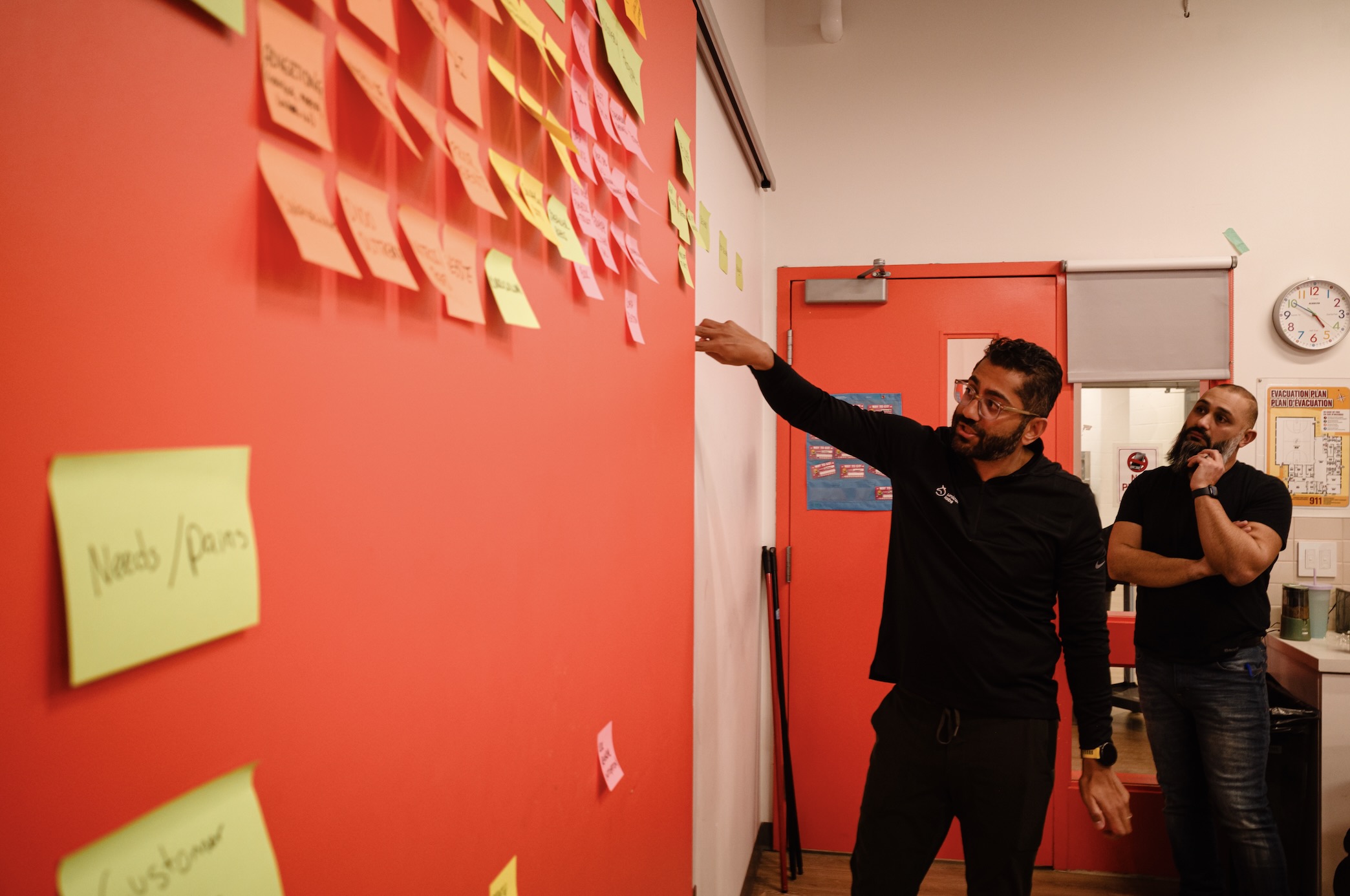 A leader presenting a detailed leadership development plan with various strategic sections.