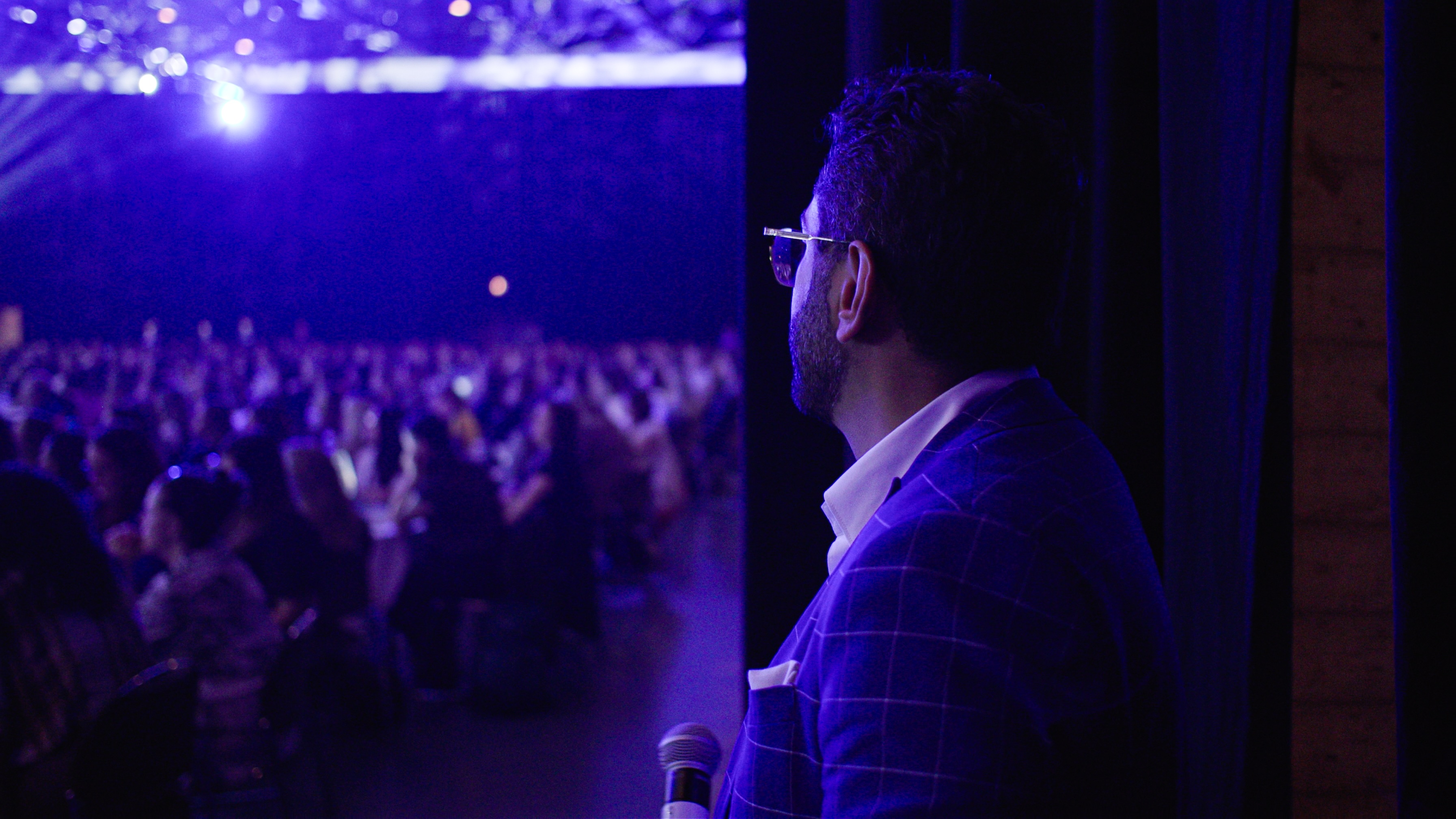 Fahd getting ready to go speak on stage.