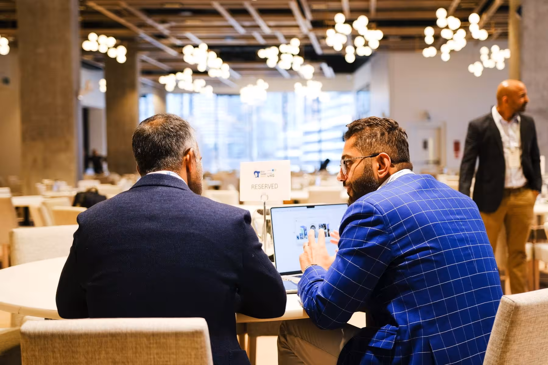 Two leaders working through the numbers together