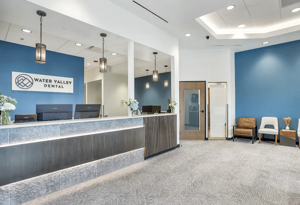 Doctor addressing patient at Precision Dental