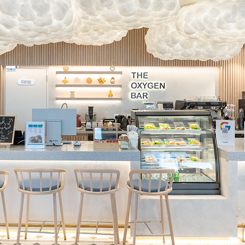 Oxygen Bar cafe at Cloud Spaces Kingdom Center Riyadh with bar seating and fresh food display