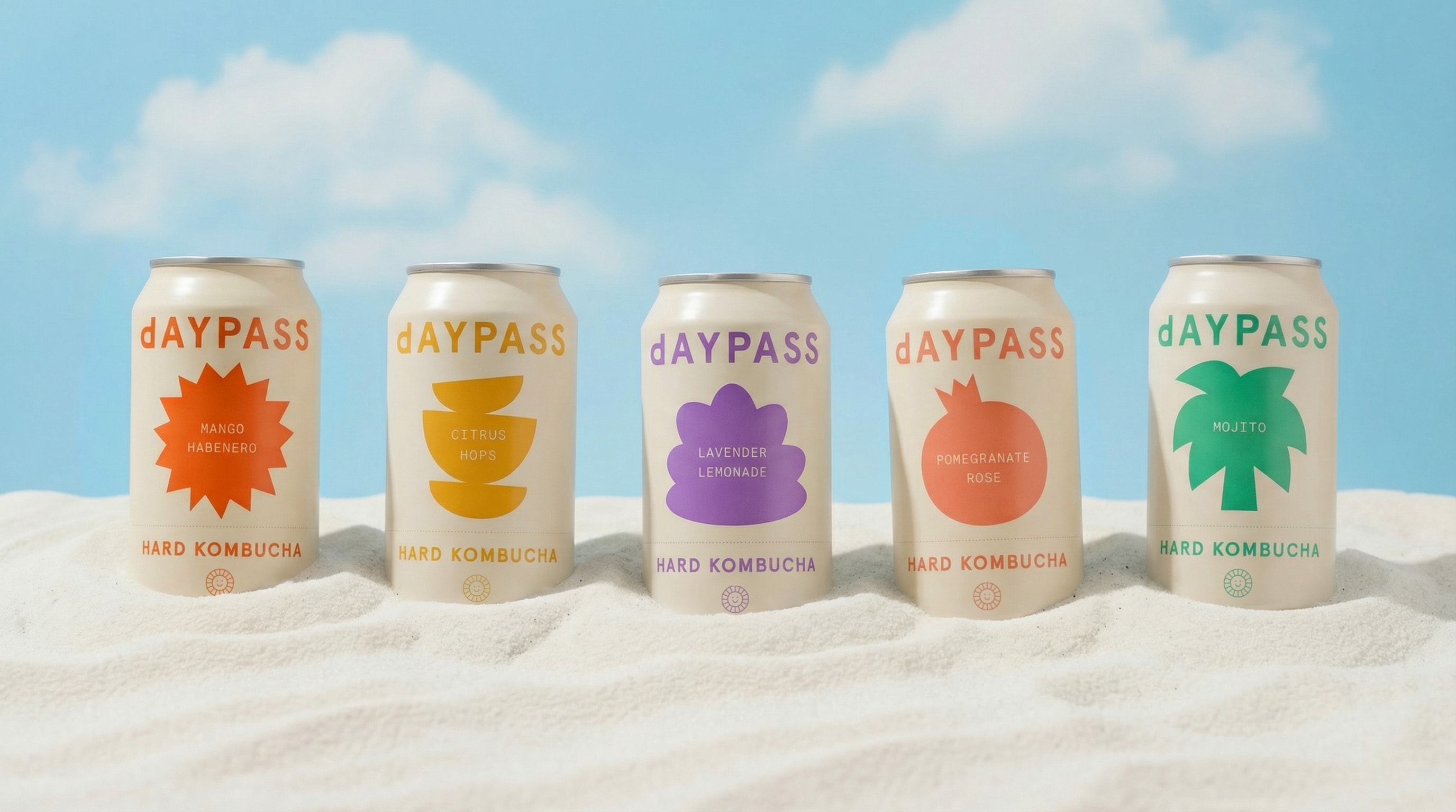 All five Daypass flavor cans lined up in the sand at the beach