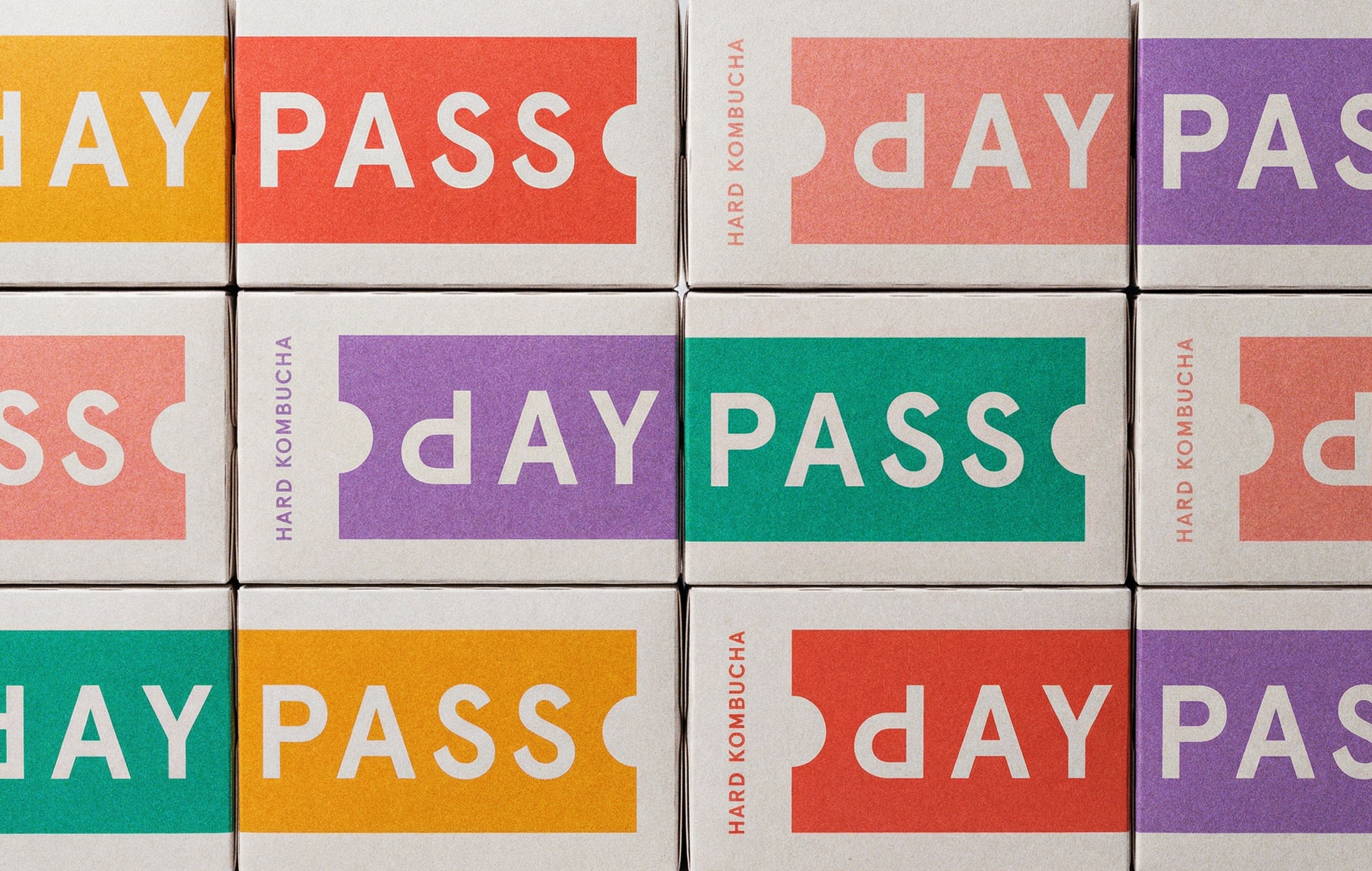 Grid of colorful Daypass variety box sets displayed together