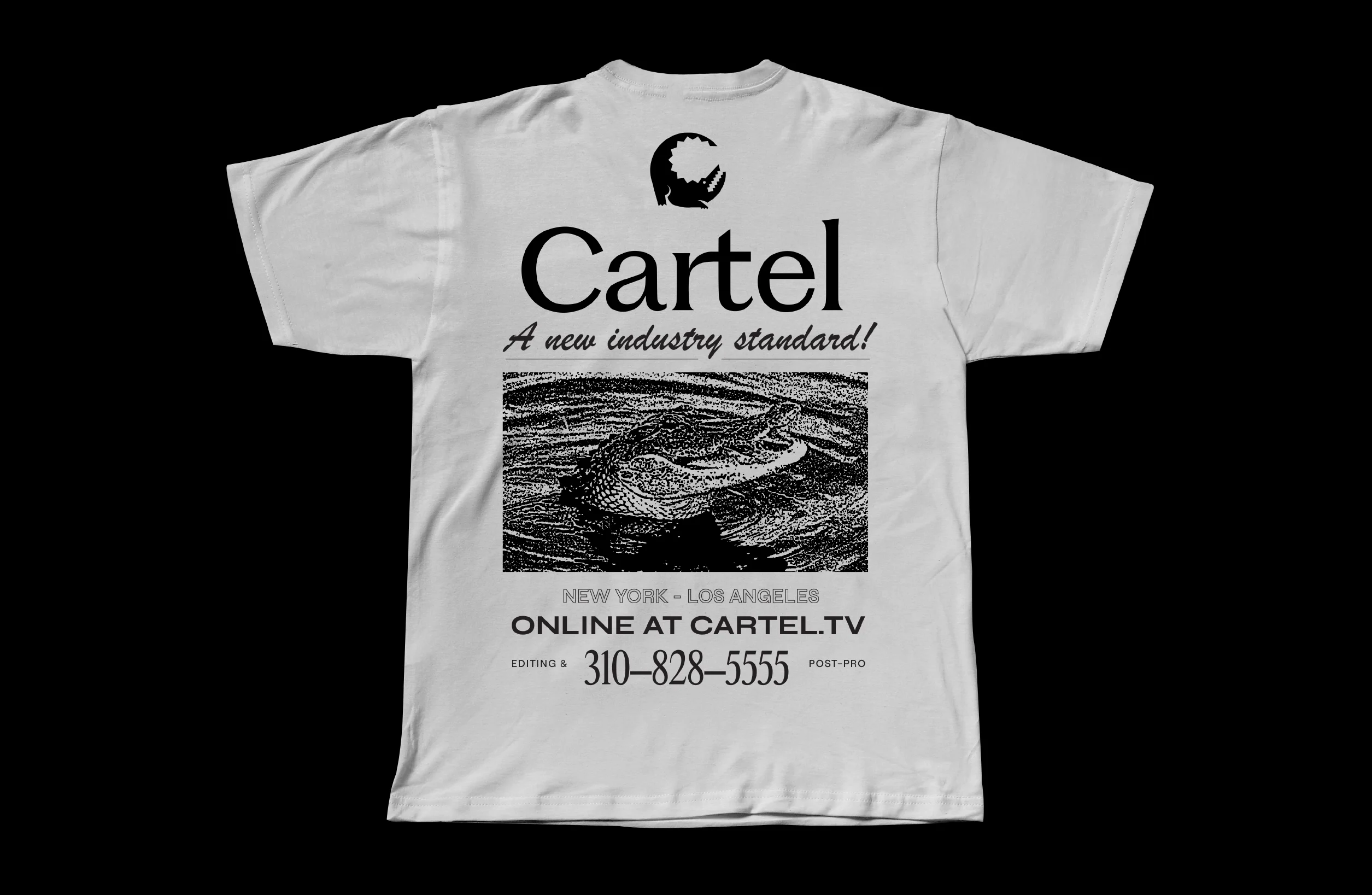 Back of a white Cartel t-shirt — 'A new industry standard!' tagline, alligator illustration, and cartel.tv contact