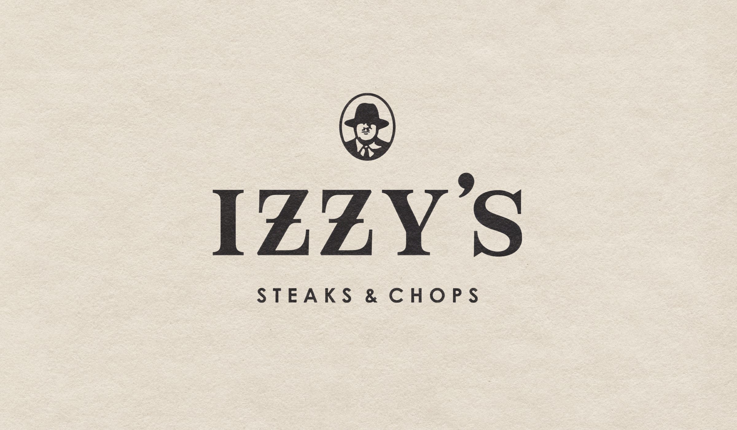 Izzy's Steaks & Chops full wordmark logo — Izzy oval icon above 'IZZY'S Steaks & Chops' on cream textured background