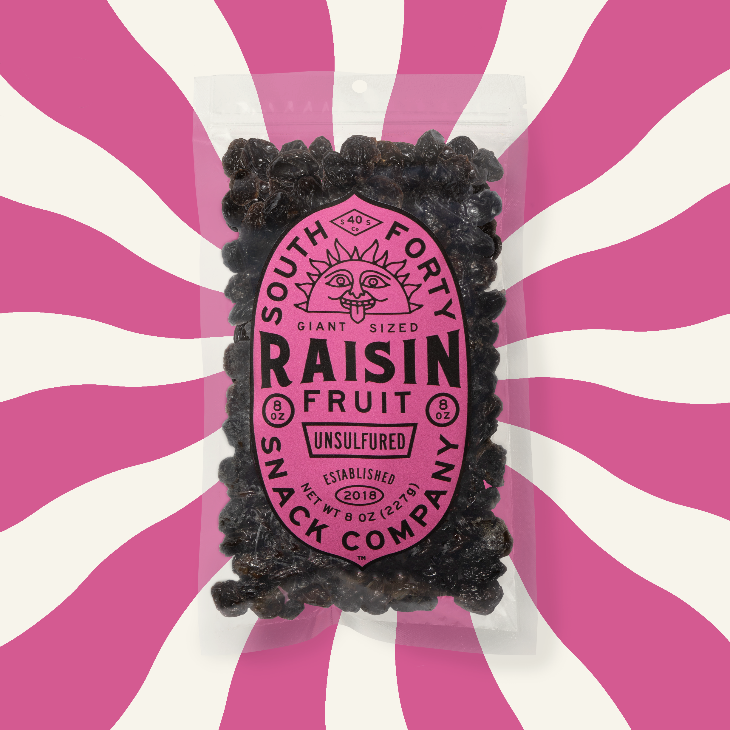South Forty Giant Sized Raisin Fruit bag centered on a pink and cream sunray background