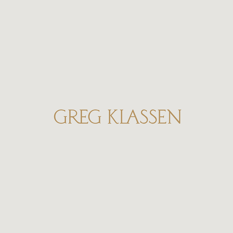 Gold Greg Klassen wordmark centered on a cream off-white square background