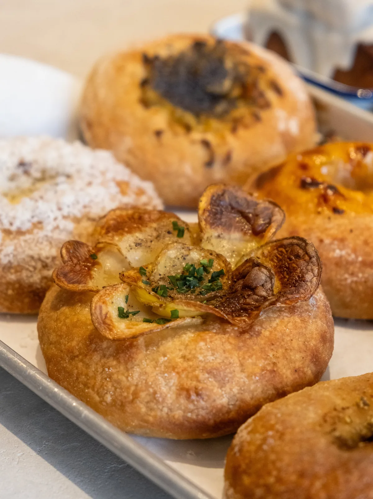 Close-up of a bialy on a plate at Bialy Bird cafe