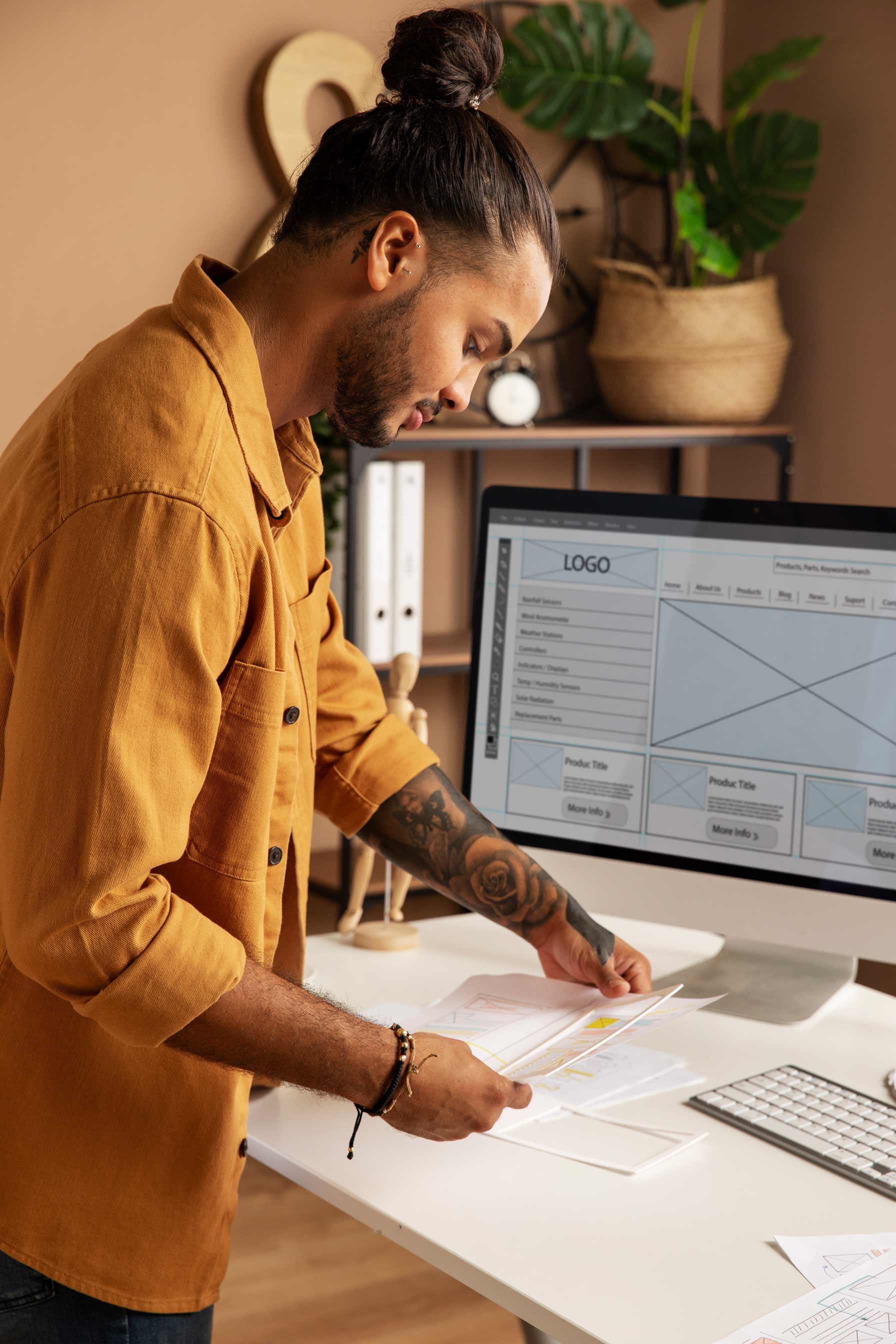 Medium shot of a man working at his desk