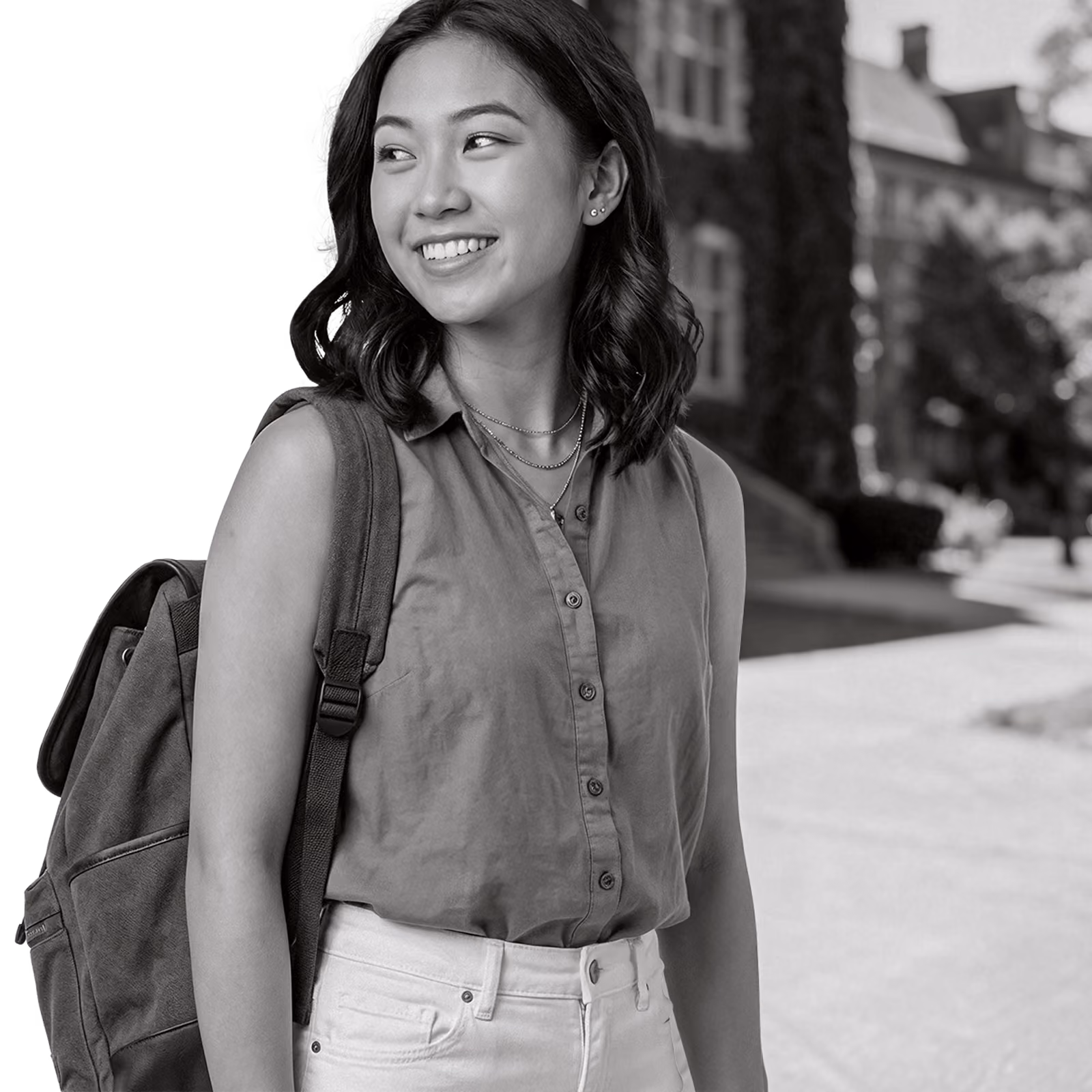 student looking over her shoulder smiling