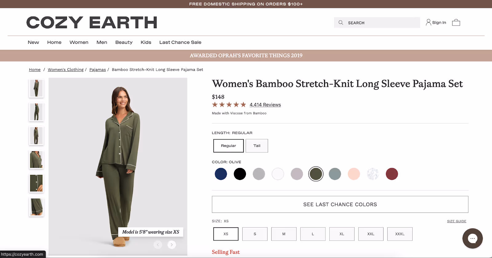 Woman models olive bamboo pajama set with button top and pants on Cozy Earth product page.