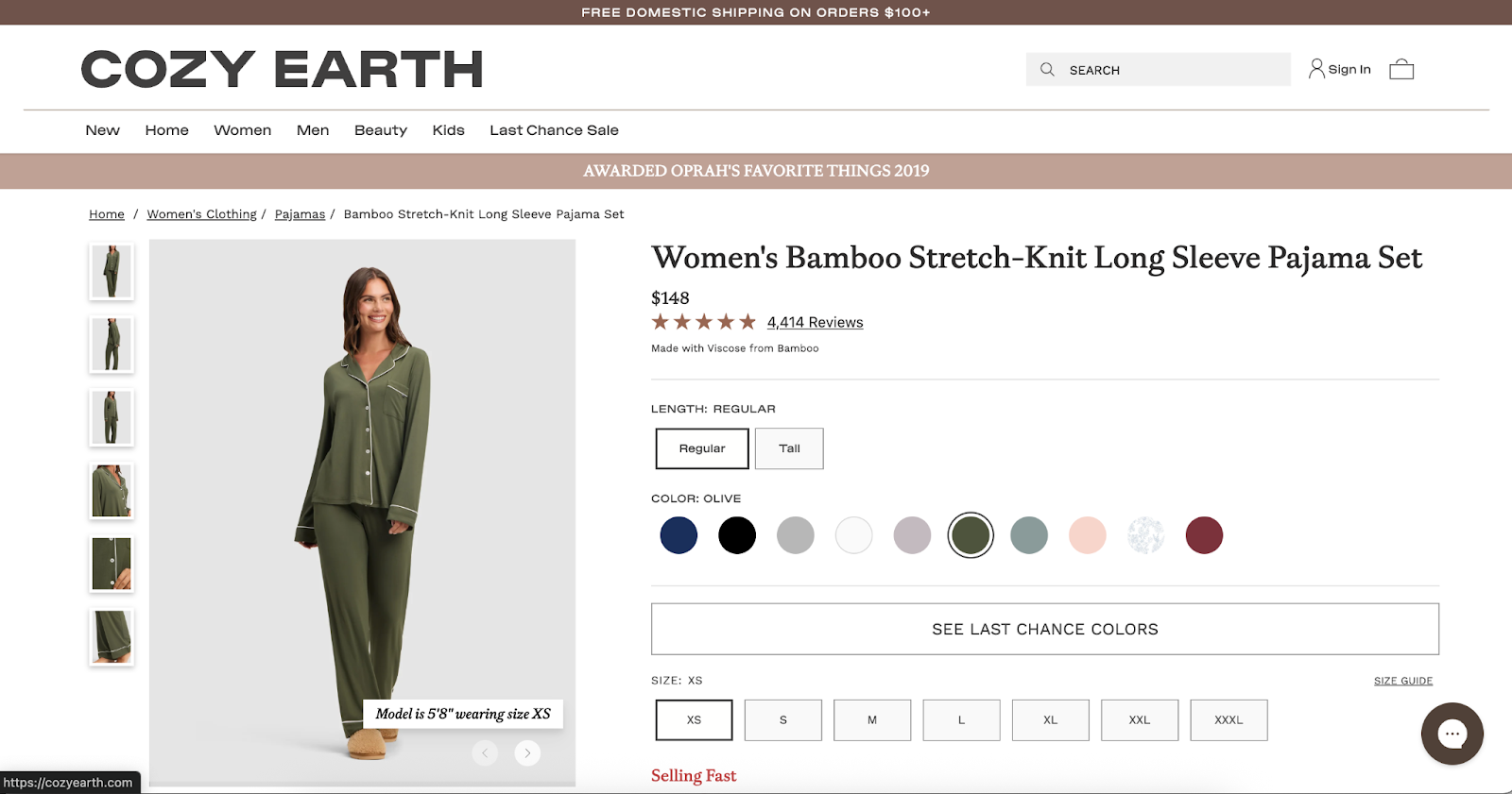 Woman models olive bamboo pajama set with button top and pants on Cozy Earth product page.