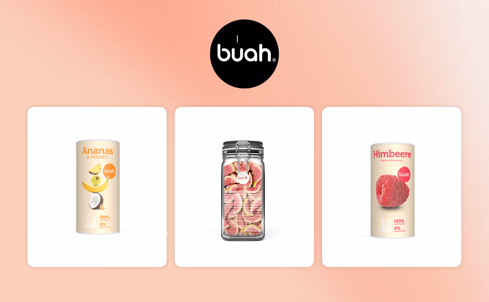 Product display for buah, featuring three dried fruit products. The left shows a tropical blend, the middle is figs, and the right is dried raspberries.
