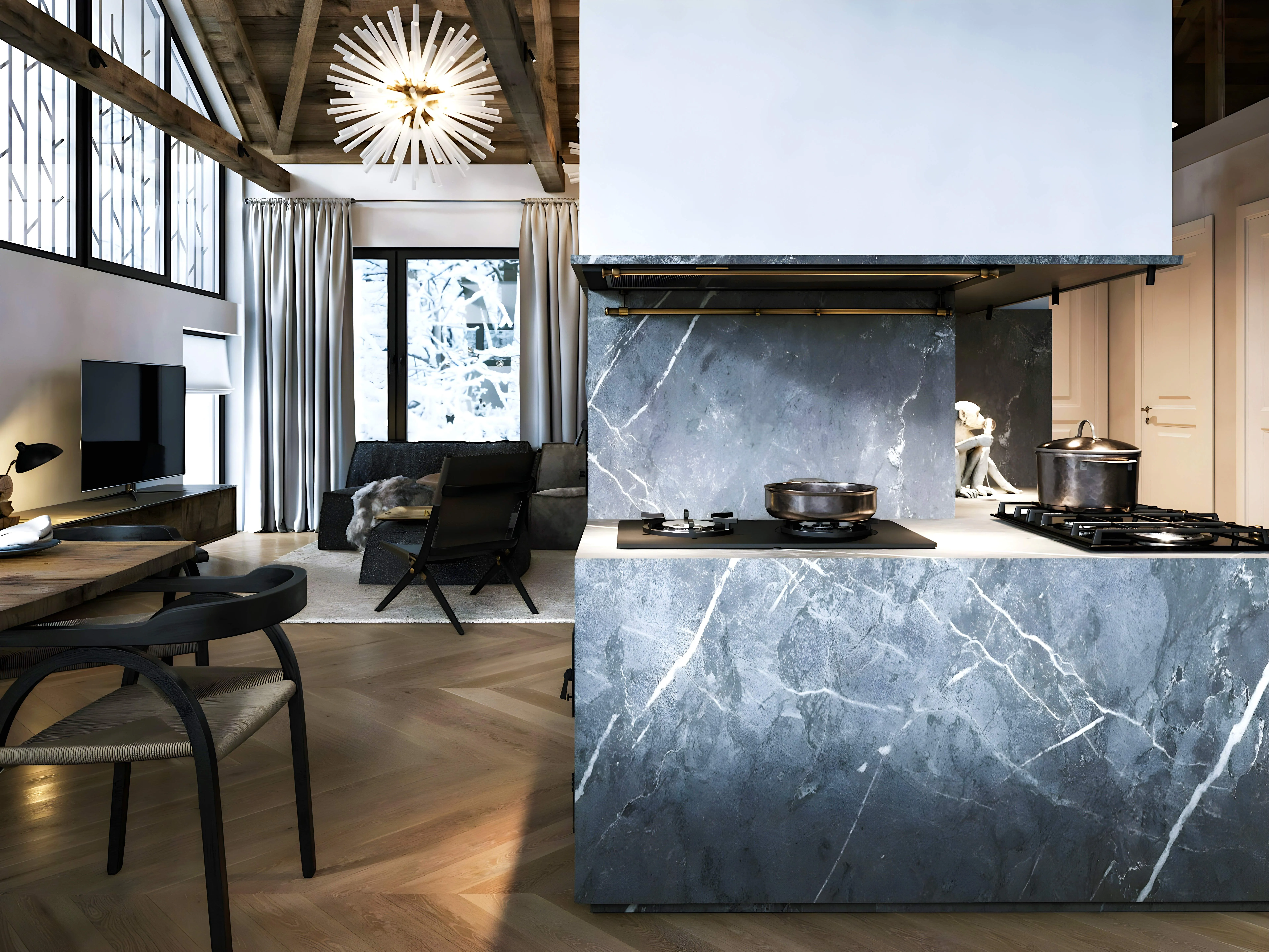 Open-plan kitchen with grey marble island and suspended extractor hood