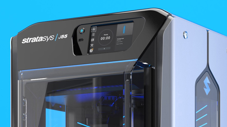 Stratasys 3D printer on a blue background.