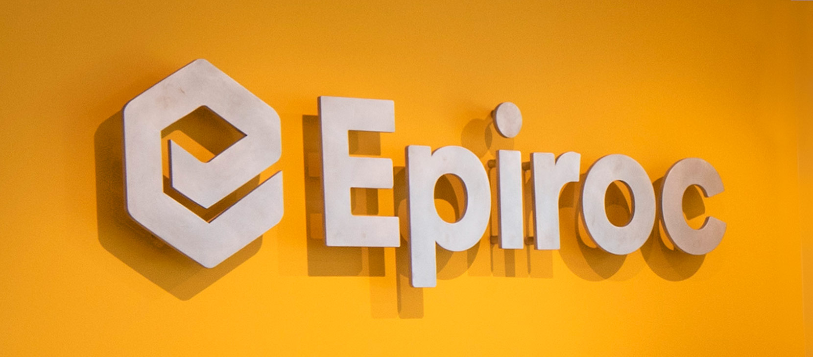 large Epiroc logo made of metal