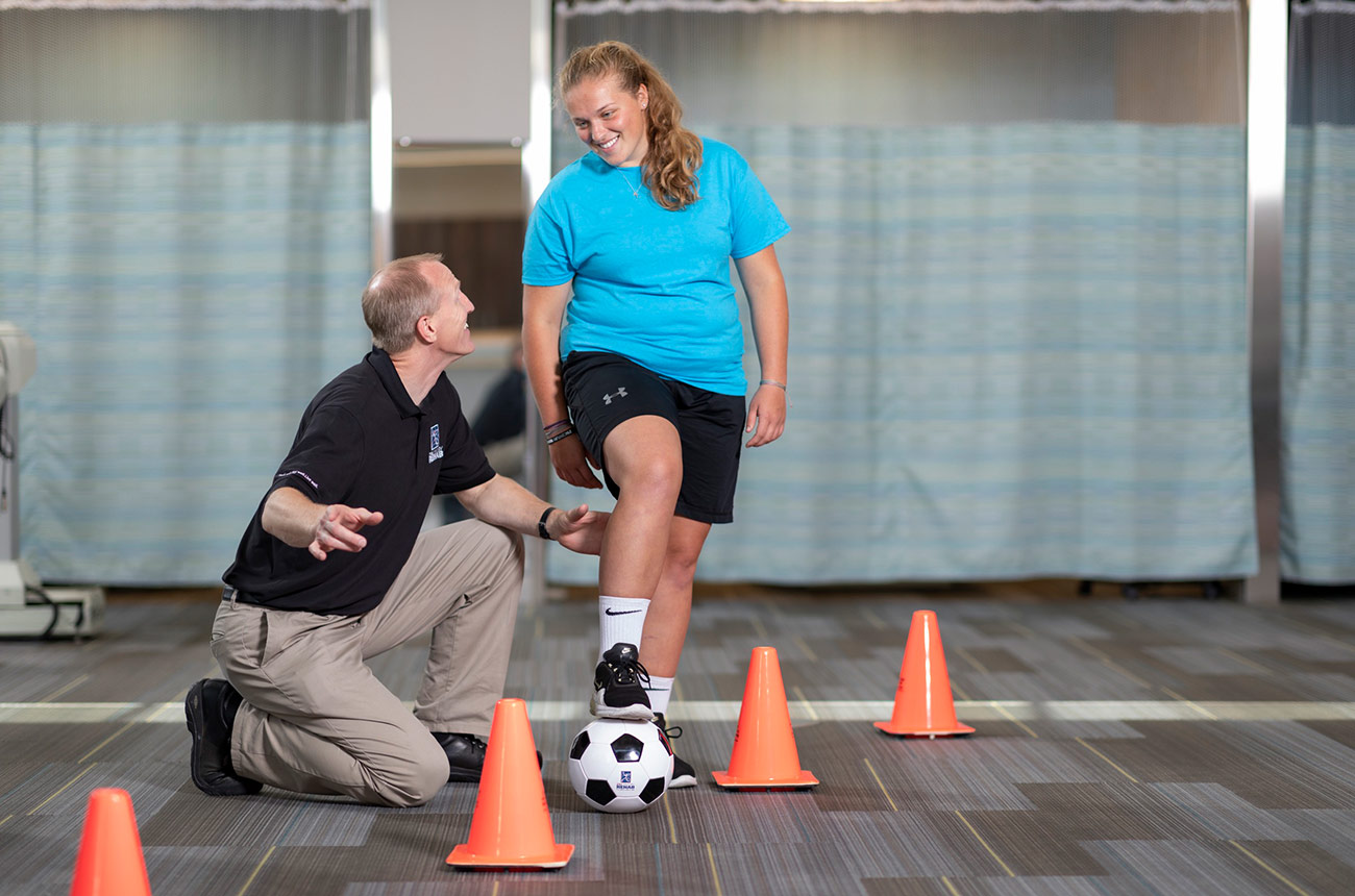 soccer player doing physical therapy