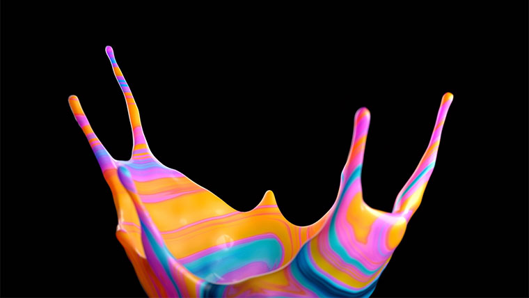 Bright orange, pink, and blue abstract object on a black background.