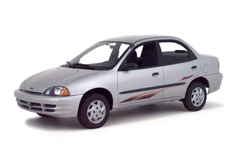 Silver 2000 Geo Metro Hatchback.