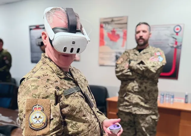 Man in a military uniform using a StellarX-branded Meta Quest 3 headset.