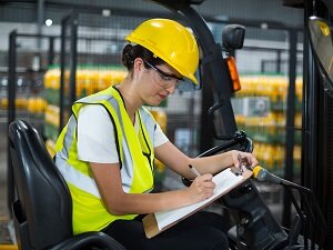 Forklift Operator, Writing on Clipboard, Wearing Hardhat