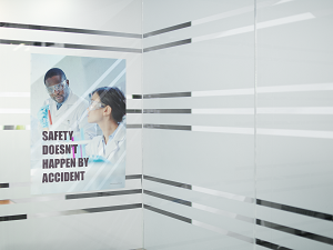 Safety Poster on Glass Wall