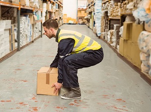 Warehouse Worker Demonstrating Proper Lifting Technique