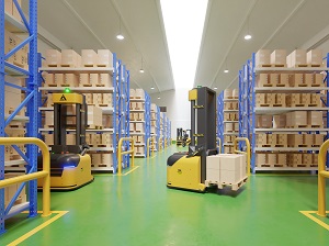 Automated Guided Vehicle performing work in a warehouse similar to a forklift.