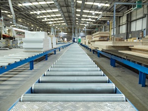 Close-up view of a conveyor in an industrial facility.